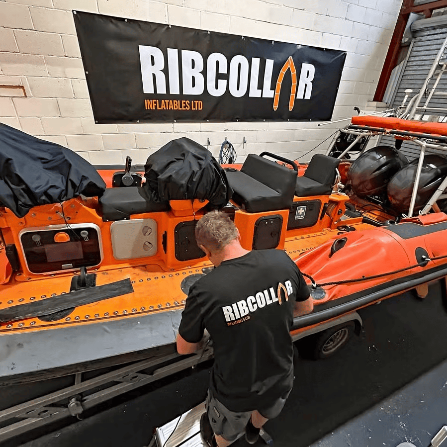 Tube Technician repairing RNLI Atlantic 75 Collar