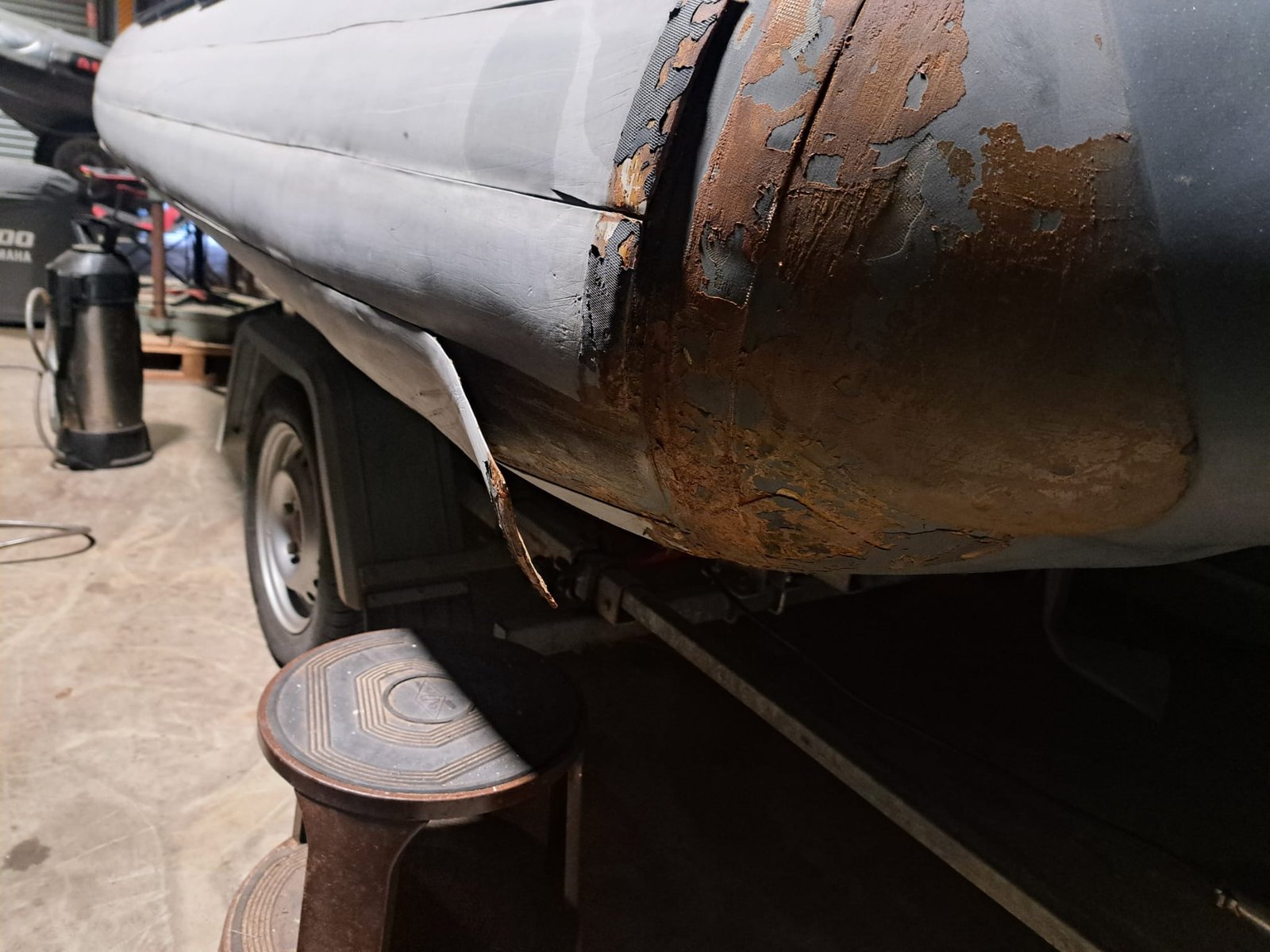 Badly damaged Avon Sea Rider Hypalon tube needing repair at Ribcollar